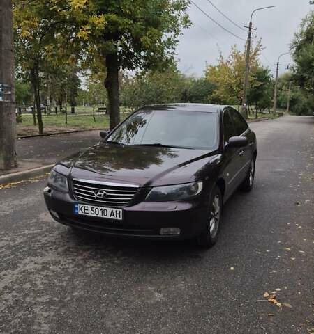 Красный Хендай Грандер, объемом двигателя 3.34 л и пробегом 243 тыс. км за 4000 $, фото 1 на Automoto.ua