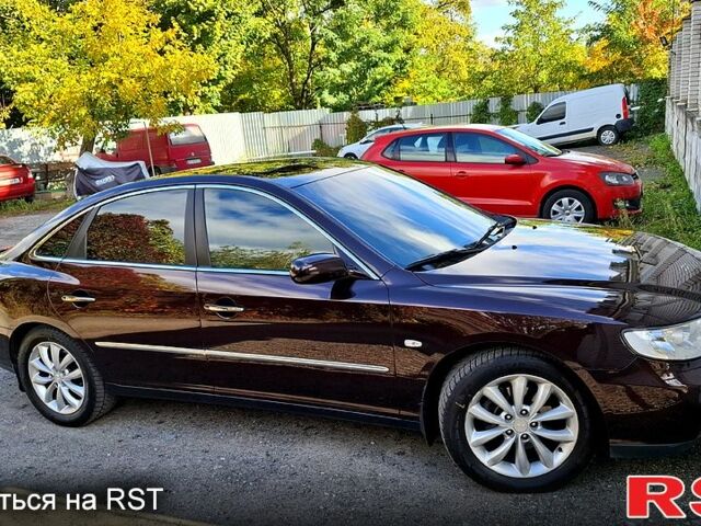 Червоний Хендай Грандер, об'ємом двигуна 3.3 л та пробігом 280 тис. км за 6500 $, фото 1 на Automoto.ua