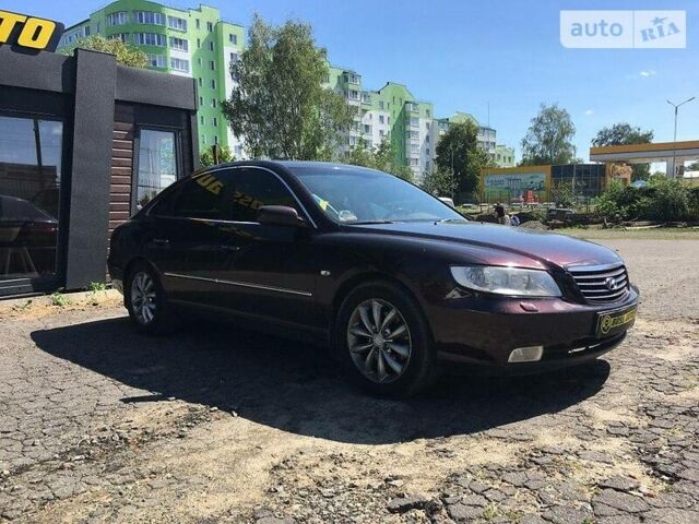 Красный Хендай Грандер, объемом двигателя 3.3 л и пробегом 270 тыс. км за 9500 $, фото 1 на Automoto.ua