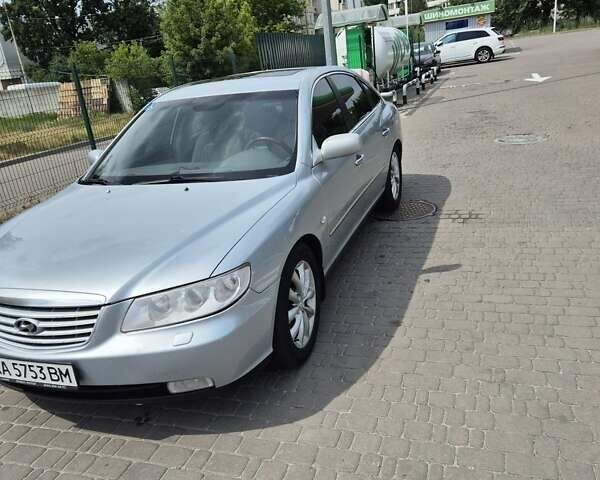 Серый Хендай Грандер, объемом двигателя 3.3 л и пробегом 265 тыс. км за 7000 $, фото 1 на Automoto.ua