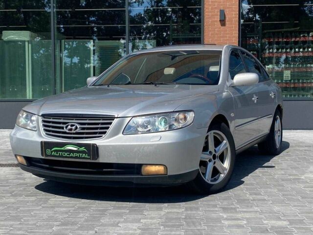 Серый Хендай Грандер, объемом двигателя 3.3 л и пробегом 237 тыс. км за 5290 $, фото 1 на Automoto.ua