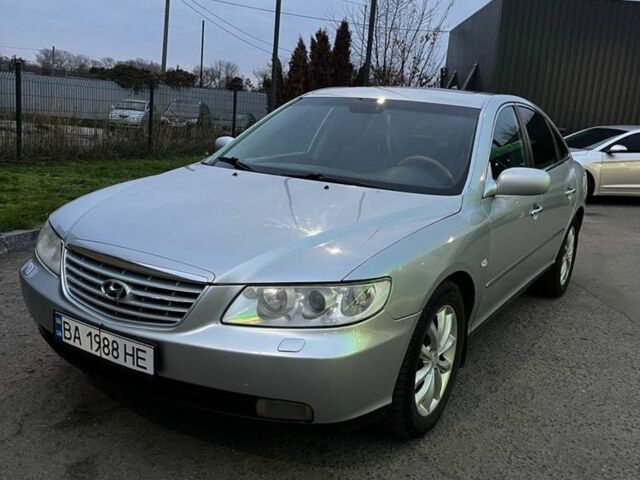 Серый Хендай Грандер, объемом двигателя 3.3 л и пробегом 200 тыс. км за 5800 $, фото 1 на Automoto.ua