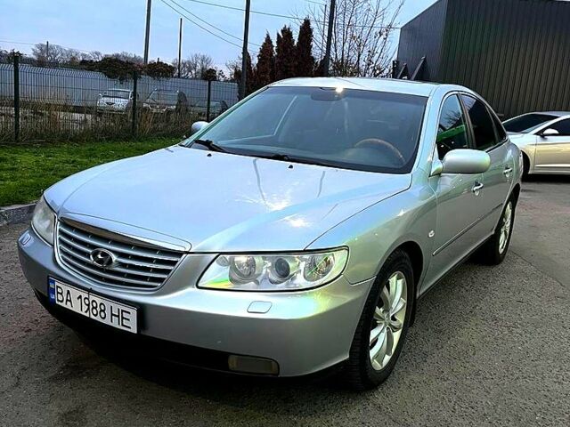 Серый Хендай Грандер, объемом двигателя 3.3 л и пробегом 200 тыс. км за 5800 $, фото 1 на Automoto.ua