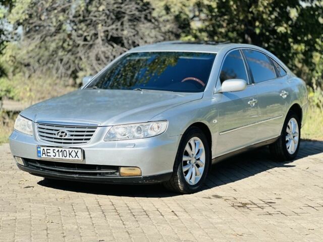 Серый Хендай Грандер, объемом двигателя 3.3 л и пробегом 290 тыс. км за 5700 $, фото 1 на Automoto.ua