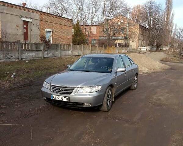 Серый Хендай Грандер, объемом двигателя 3.3 л и пробегом 88 тыс. км за 8800 $, фото 1 на Automoto.ua