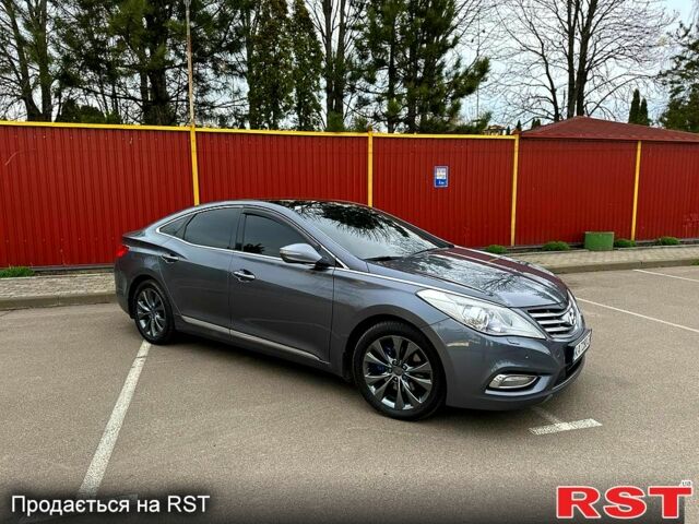 Серый Хендай Грандер, объемом двигателя 3 л и пробегом 206 тыс. км за 12000 $, фото 1 на Automoto.ua