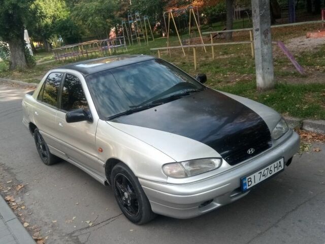 Серый Хендай Лантра, объемом двигателя 1.6 л и пробегом 260 тыс. км за 1300 $, фото 1 на Automoto.ua