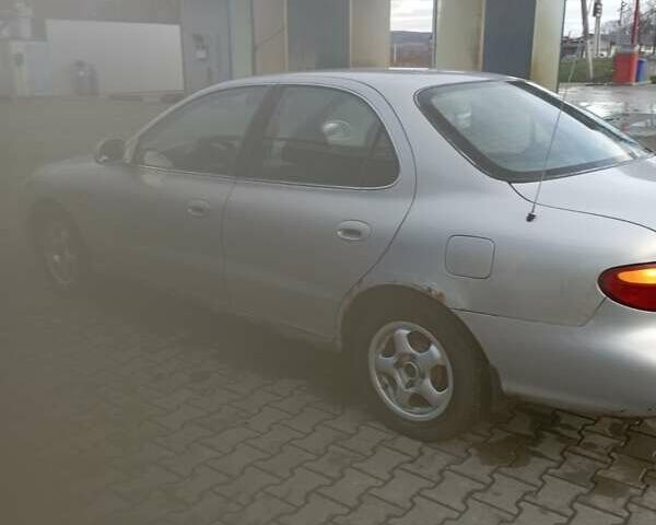 Серый Хендай Лантра, объемом двигателя 1.8 л и пробегом 320 тыс. км за 1200 $, фото 1 на Automoto.ua