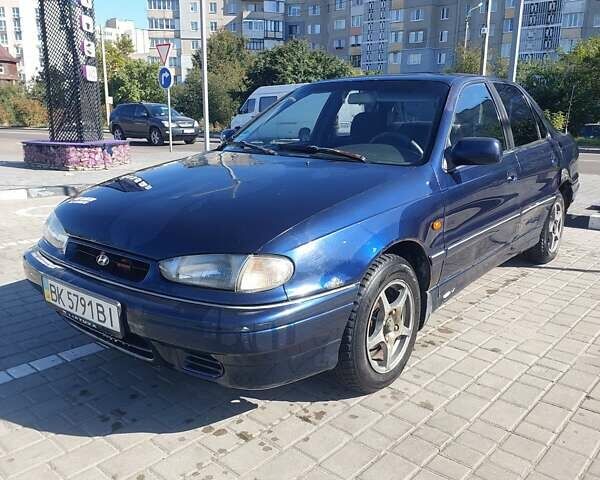 Синий Хендай Лантра, объемом двигателя 1.47 л и пробегом 320 тыс. км за 999 $, фото 1 на Automoto.ua