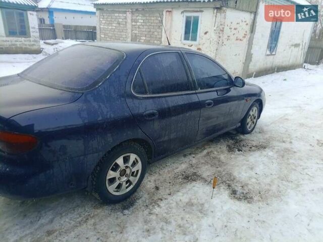 Синий Хендай Лантра, объемом двигателя 1.8 л и пробегом 500 тыс. км за 2300 $, фото 1 на Automoto.ua