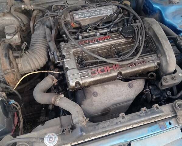 Зеленый Хендай Лантра, объемом двигателя 1.6 л и пробегом 200 тыс. км за 900 $, фото 1 на Automoto.ua