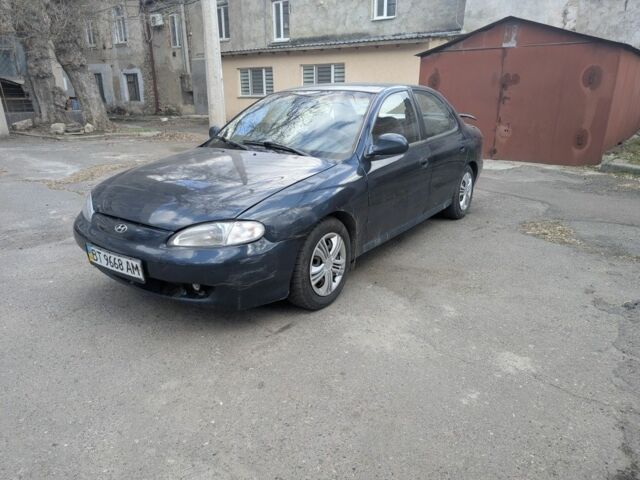 Зеленый Хендай Лантра, объемом двигателя 1.8 л и пробегом 100 тыс. км за 1000 $, фото 1 на Automoto.ua