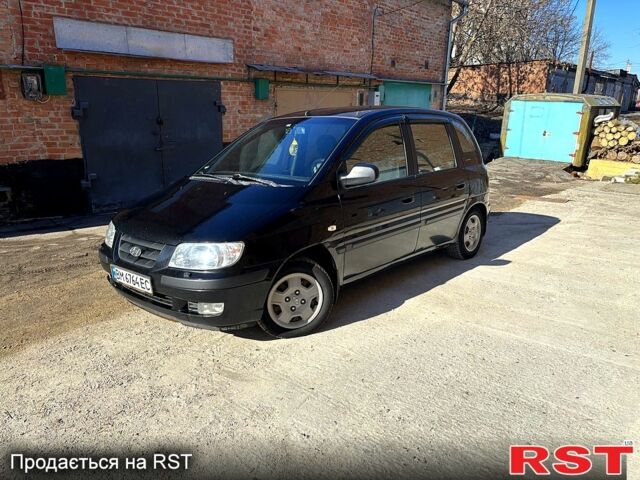 Черный Хендай Матрикс, объемом двигателя 1.8 л и пробегом 211 тыс. км за 3300 $, фото 1 на Automoto.ua