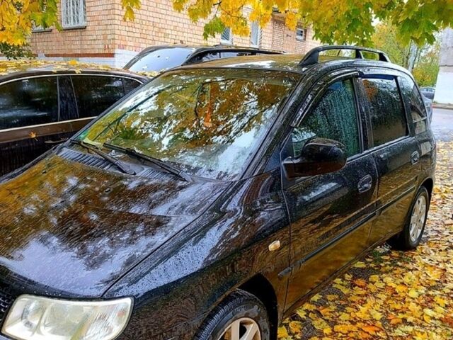 Черный Хендай Матрикс, объемом двигателя 1.6 л и пробегом 392 тыс. км за 3200 $, фото 1 на Automoto.ua
