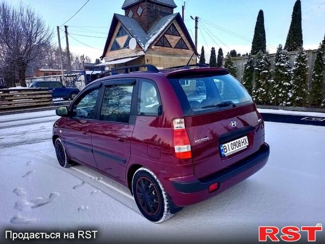 Красный Хендай Матрикс, объемом двигателя 1.8 л и пробегом 159 тыс. км за 5000 $, фото 1 на Automoto.ua