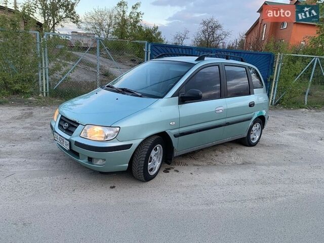 Синий Хендай Матрикс, объемом двигателя 1.6 л и пробегом 250 тыс. км за 1550 $, фото 1 на Automoto.ua