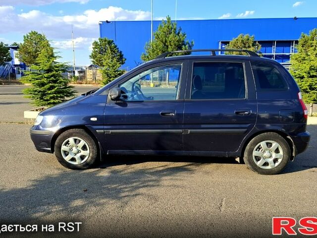 Синий Хендай Матрикс, объемом двигателя 1.6 л и пробегом 245 тыс. км за 3500 $, фото 1 на Automoto.ua