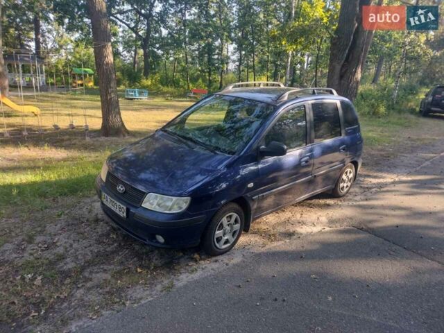 Синий Хендай Матрикс, объемом двигателя 1.5 л и пробегом 309 тыс. км за 4200 $, фото 1 на Automoto.ua