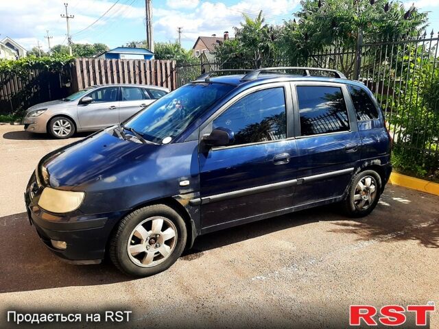 Синий Хендай Матрикс, объемом двигателя 1.6 л и пробегом 252 тыс. км за 3900 $, фото 1 на Automoto.ua