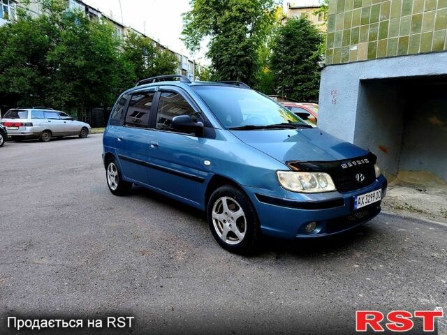 Синий Хендай Матрикс, объемом двигателя 1.6 л и пробегом 255 тыс. км за 4400 $, фото 1 на Automoto.ua