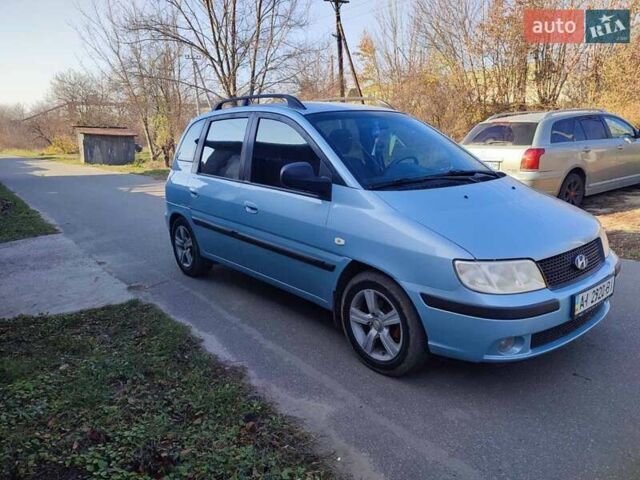 Синий Хендай Матрикс, объемом двигателя 1.6 л и пробегом 227 тыс. км за 4800 $, фото 1 на Automoto.ua