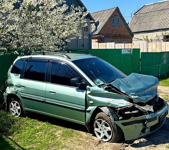 Зеленый Хендай Матрикс, объемом двигателя 1.8 л и пробегом 365 тыс. км за 3000 $, фото 1 на Automoto.ua