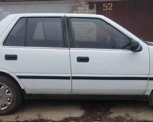 Белый Хендай Пони, объемом двигателя 1.5 л и пробегом 300 тыс. км за 1776 $, фото 1 на Automoto.ua