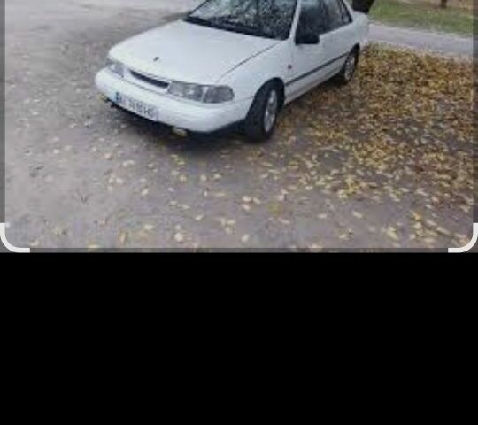 Белый Хендай Пони, объемом двигателя 2 л и пробегом 200 тыс. км за 700 $, фото 1 на Automoto.ua