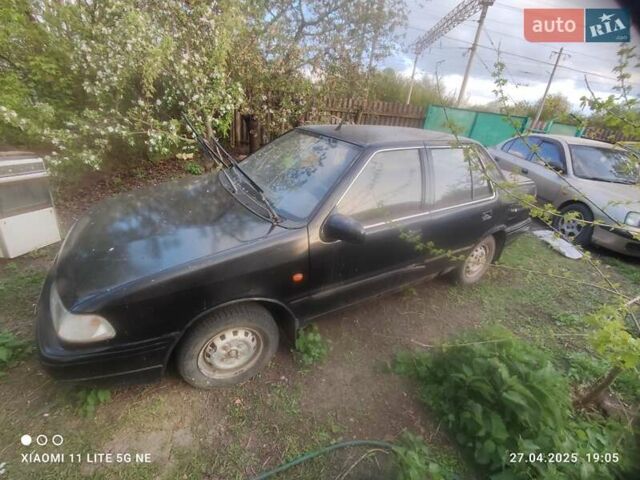 Черный Хендай Пони, объемом двигателя 1.5 л и пробегом 290 тыс. км за 270 $, фото 1 на Automoto.ua