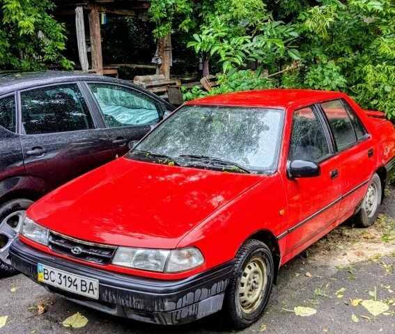 Красный Хендай Пони, объемом двигателя 1.3 л и пробегом 339 тыс. км за 800 $, фото 1 на Automoto.ua