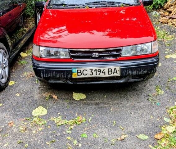 Красный Хендай Пони, объемом двигателя 1.3 л и пробегом 339 тыс. км за 700 $, фото 1 на Automoto.ua