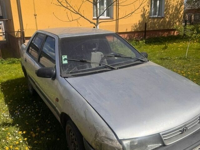 Сірий Хендай Поні, об'ємом двигуна 1.5 л та пробігом 274 тис. км за 550 $, фото 1 на Automoto.ua