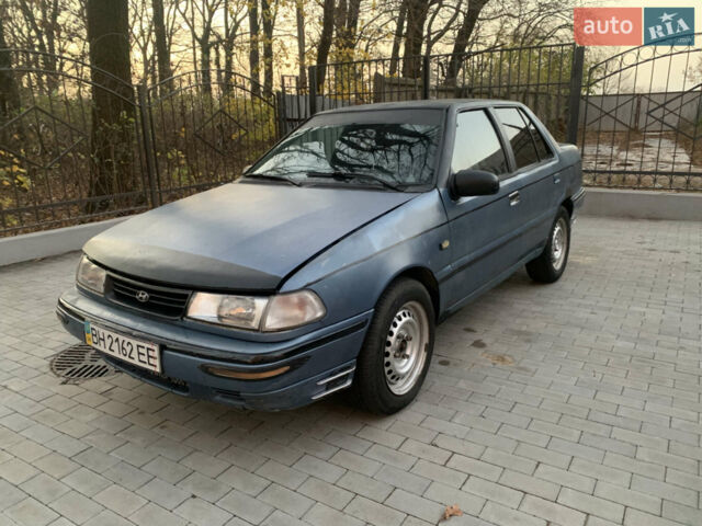 Синий Хендай Пони, объемом двигателя 1.47 л и пробегом 300 тыс. км за 1050 $, фото 1 на Automoto.ua