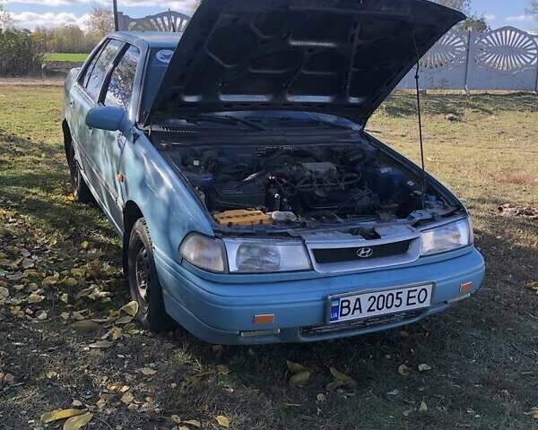 Синий Хендай Пони, объемом двигателя 1.5 л и пробегом 315 тыс. км за 1100 $, фото 1 на Automoto.ua