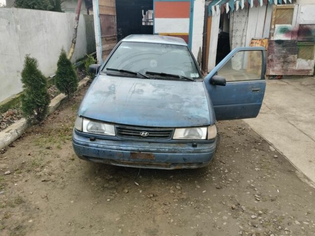 Синий Хендай Пони, объемом двигателя 1 л и пробегом 228 тыс. км за 600 $, фото 1 на Automoto.ua