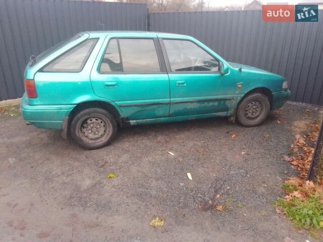 Зеленый Хендай Пони, объемом двигателя 1.47 л и пробегом 312 тыс. км за 1000 $, фото 1 на Automoto.ua