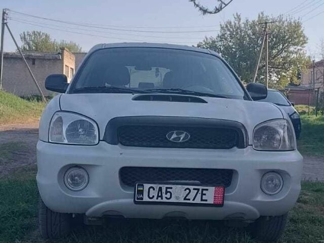 Белый Хендай Санта Фе, объемом двигателя 2.7 л и пробегом 250 тыс. км за 1500 $, фото 1 на Automoto.ua