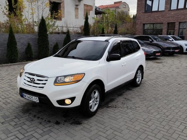 Белый Хендай Санта Фе, объемом двигателя 2.4 л и пробегом 200 тыс. км за 8300 $, фото 1 на Automoto.ua