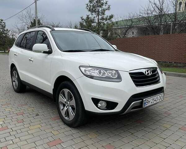 Белый Хендай Санта Фе, объемом двигателя 2.36 л и пробегом 149 тыс. км за 12850 $, фото 1 на Automoto.ua