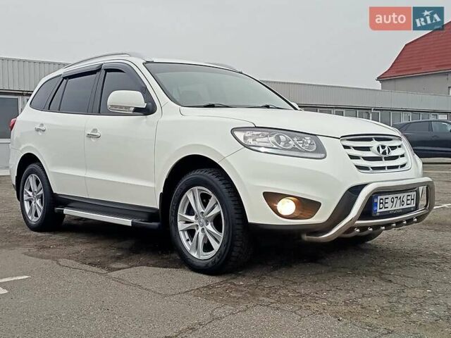 Белый Хендай Санта Фе, объемом двигателя 2.36 л и пробегом 150 тыс. км за 13500 $, фото 1 на Automoto.ua