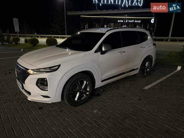 Белый Хендай Санта Фе, объемом двигателя 2 л и пробегом 145 тыс. км за 29000 $, фото 1 на Automoto.ua