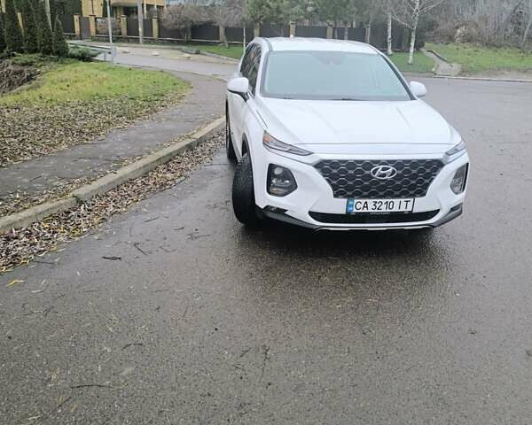 Белый Хендай Санта Фе, объемом двигателя 2.36 л и пробегом 73 тыс. км за 23800 $, фото 1 на Automoto.ua