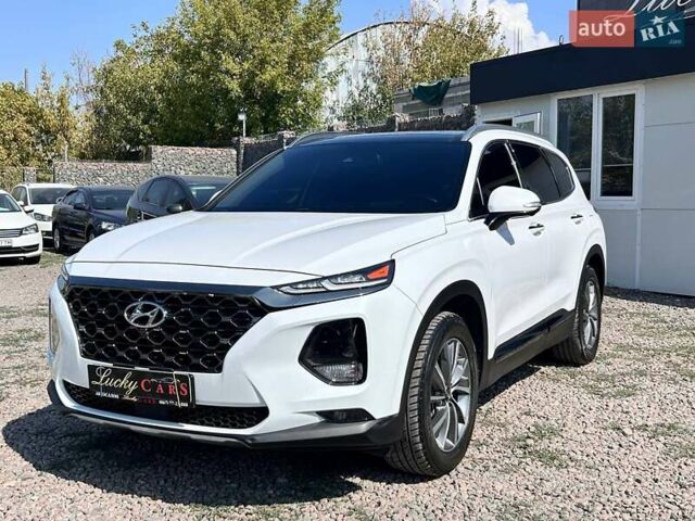 Белый Хендай Санта Фе, объемом двигателя 2.4 л и пробегом 80 тыс. км за 27500 $, фото 1 на Automoto.ua