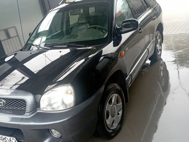 Черный Хендай Санта Фе, объемом двигателя 2 л и пробегом 300 тыс. км за 3200 $, фото 1 на Automoto.ua