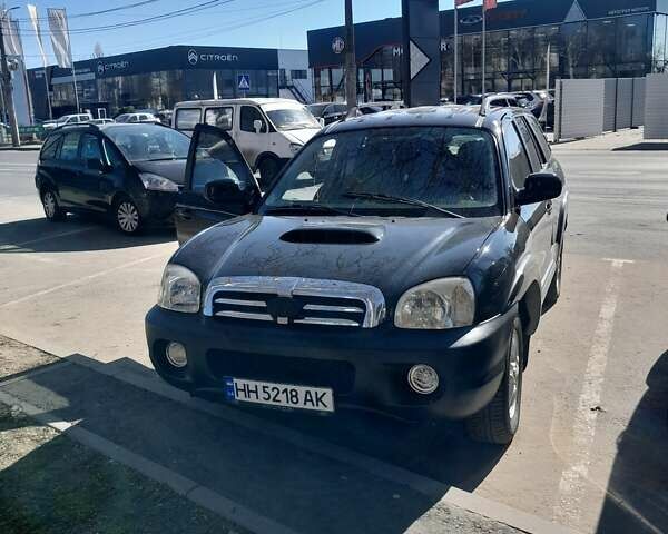 Черный Хендай Санта Фе, объемом двигателя 2 л и пробегом 260 тыс. км за 5000 $, фото 1 на Automoto.ua