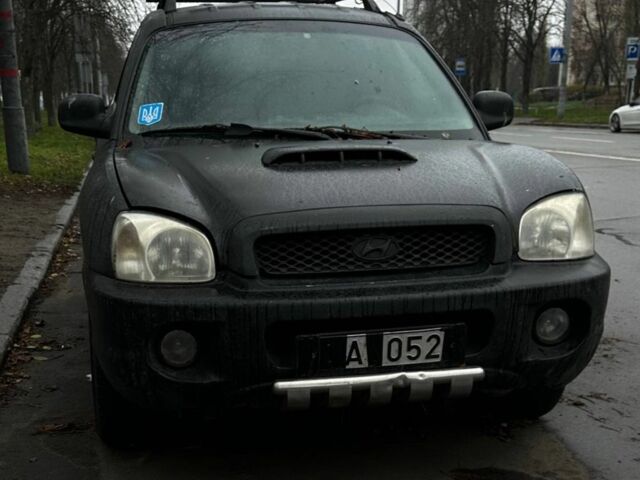 Черный Хендай Санта Фе, объемом двигателя 2 л и пробегом 111 тыс. км за 2635 $, фото 1 на Automoto.ua