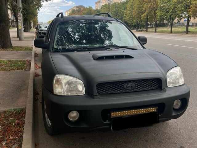 Чорний Хендай Санта Фе, об'ємом двигуна 2 л та пробігом 446 тис. км за 3209 $, фото 1 на Automoto.ua