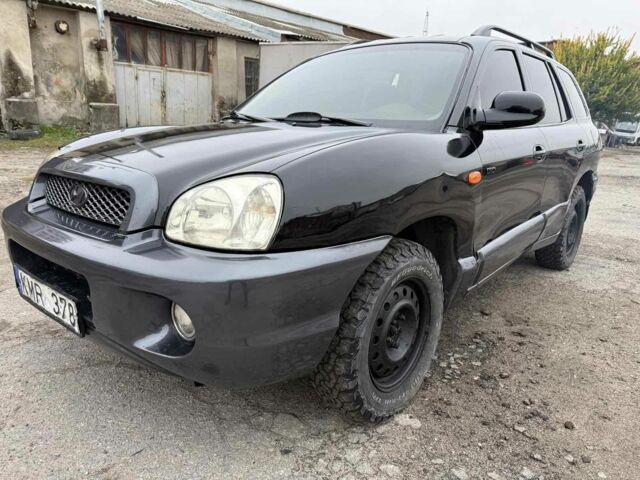 Черный Хендай Санта Фе, объемом двигателя 2 л и пробегом 278 тыс. км за 2500 $, фото 1 на Automoto.ua