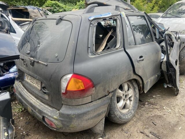 Черный Хендай Санта Фе, объемом двигателя 2 л и пробегом 185 тыс. км за 1650 $, фото 1 на Automoto.ua