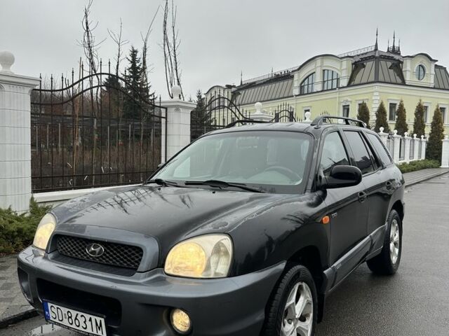 Чорний Хендай Санта Фе, об'ємом двигуна 2 л та пробігом 300 тис. км за 2700 $, фото 1 на Automoto.ua